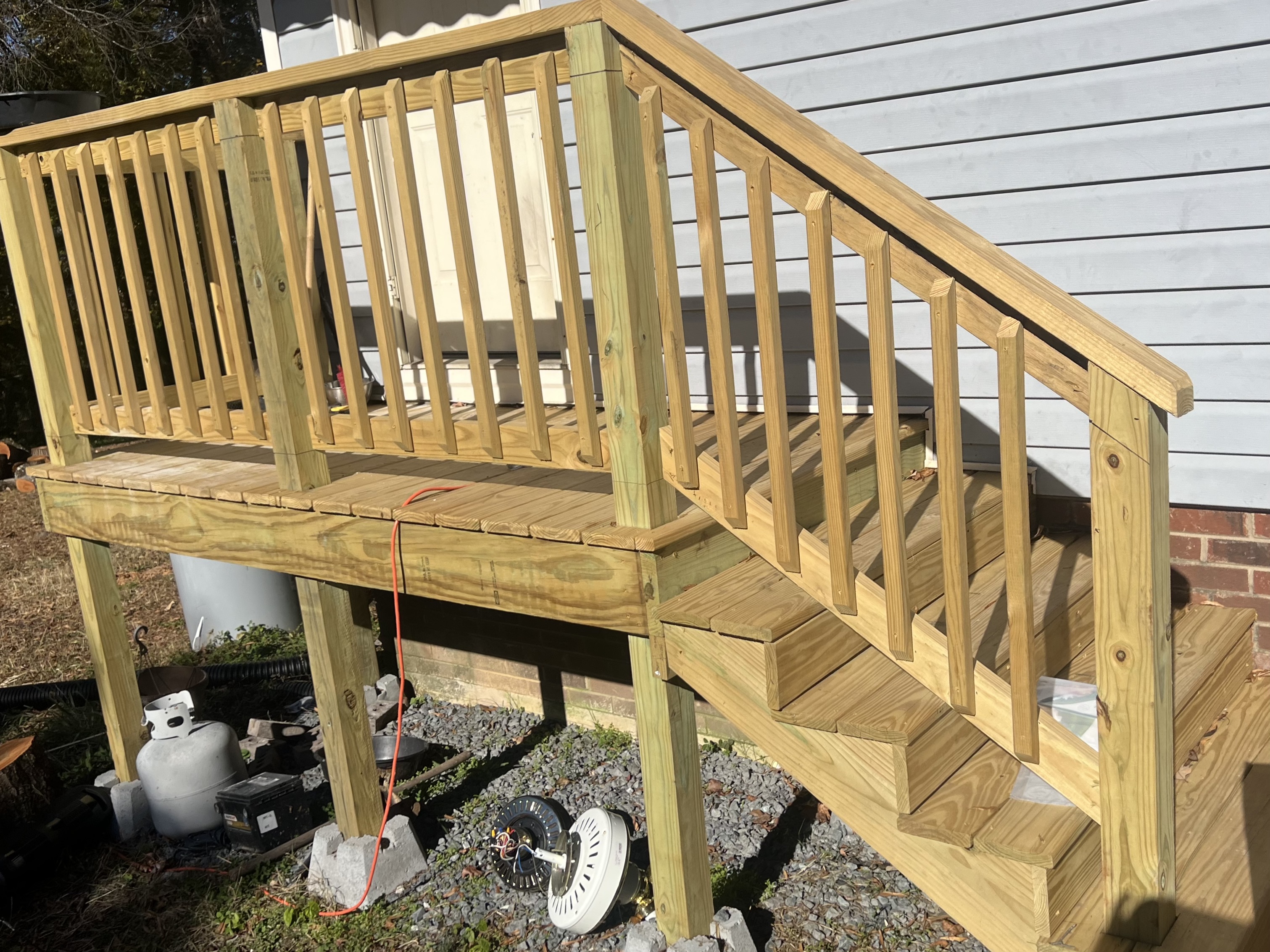 Newly built small deck with stairs.
