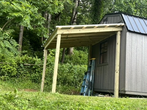 New lean-to built off an existing building.
